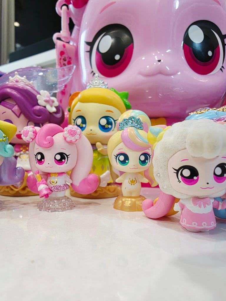 Korean kid playing with Teenieping dolls