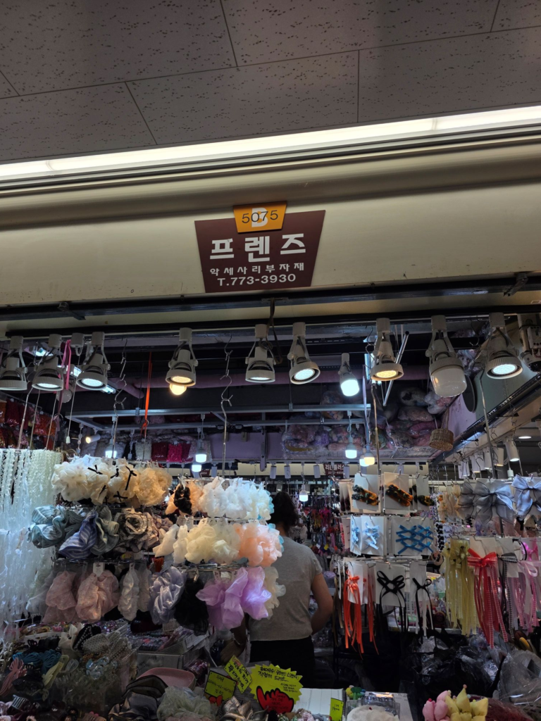 Shoppers browsing ribbon and accessory stores in Dongdaemun