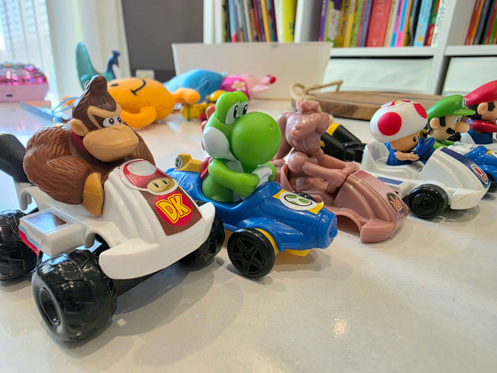Super Mario Happy Meal toys displayed together at home