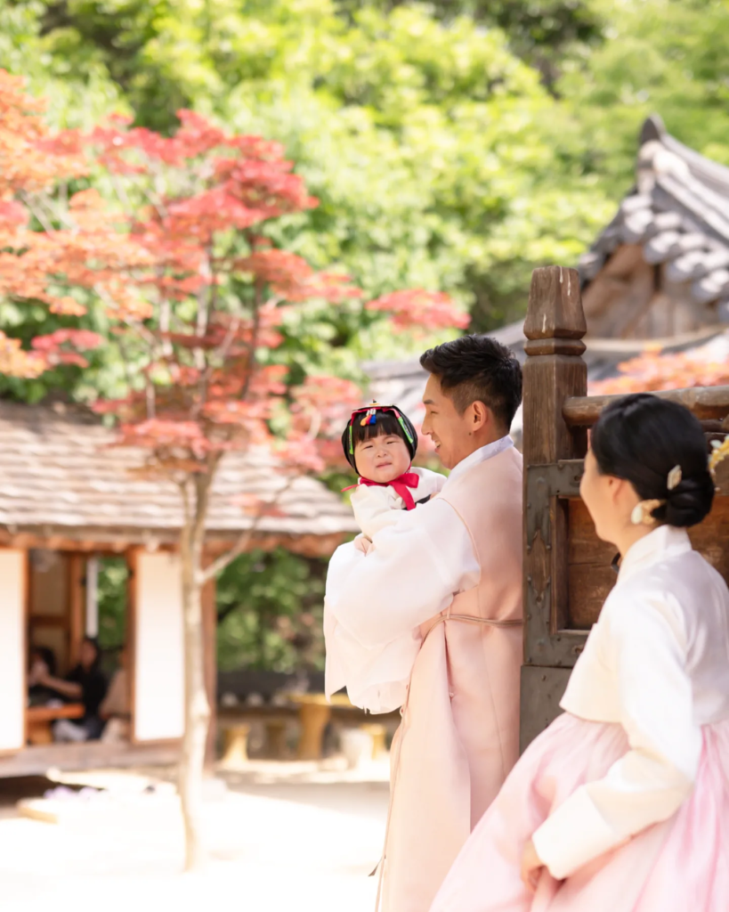 a family wearing hanbok at a Doljanchi celebration