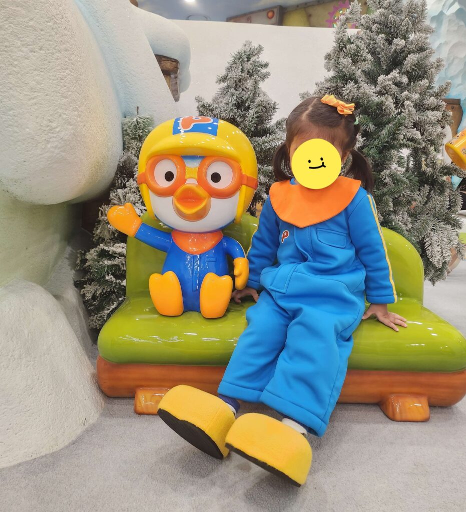 A child playing at Pororo Theme Park in Korea