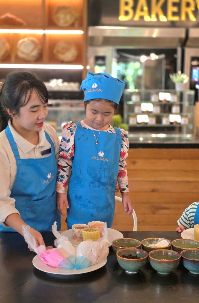 kids baking instructor and student