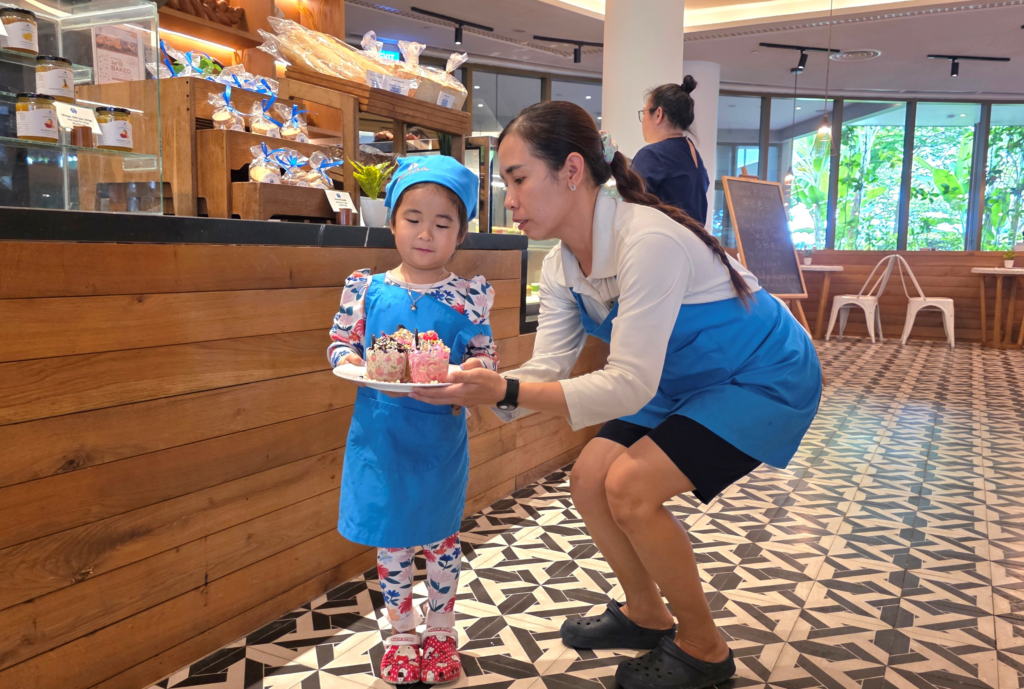 baking class teacher and child