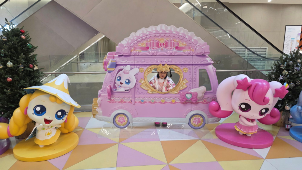 Child posing with Teenieping characters at Pangyo theme park