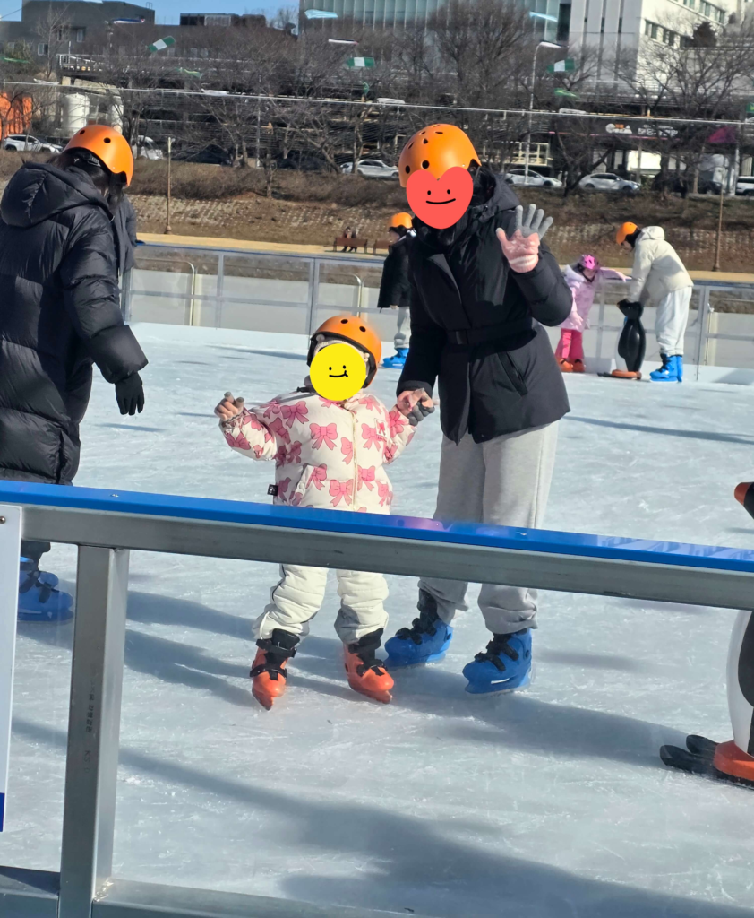 Kids learning to skate at an affordable ice rink in Yatap