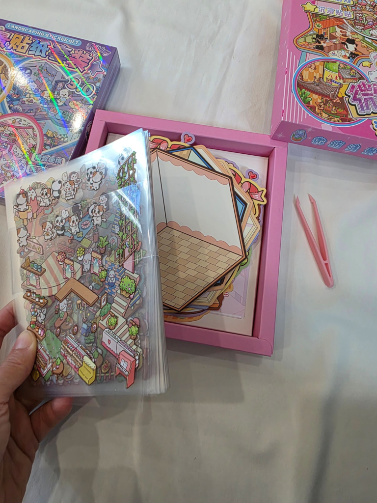 Miniature 3D sticker set laid out on the table before starting the activity