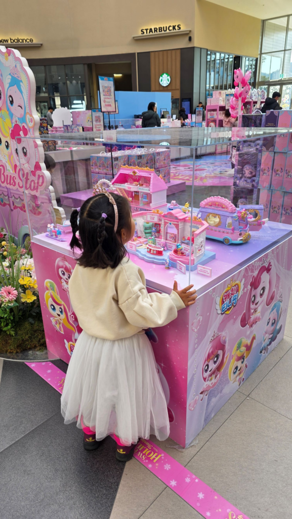 Child looking at Teenieping toys with excitement