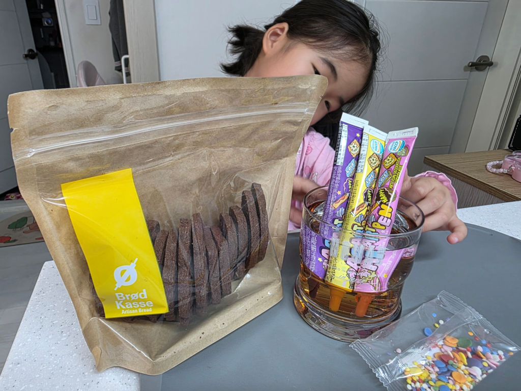 DIY cookie decorating kit with cookies chocolate pens and sprinkles