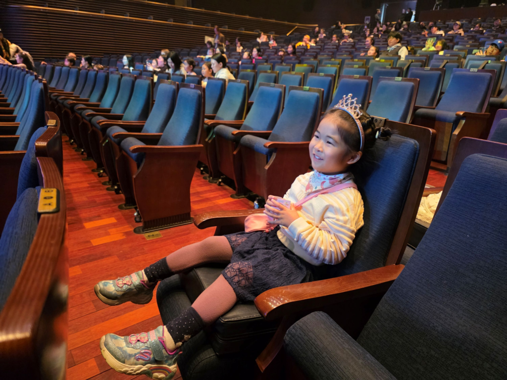 Happy child waiting for the Teenieping live show to start