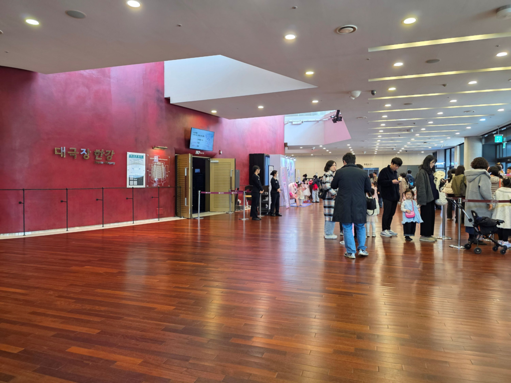 Family purchasing tickets for Teenieping Musical 2026