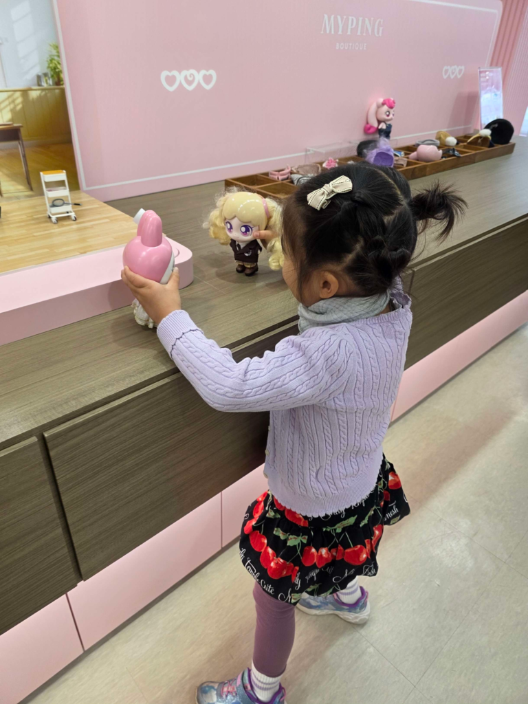 Kid enjoying MyPing activity in Seongsu store