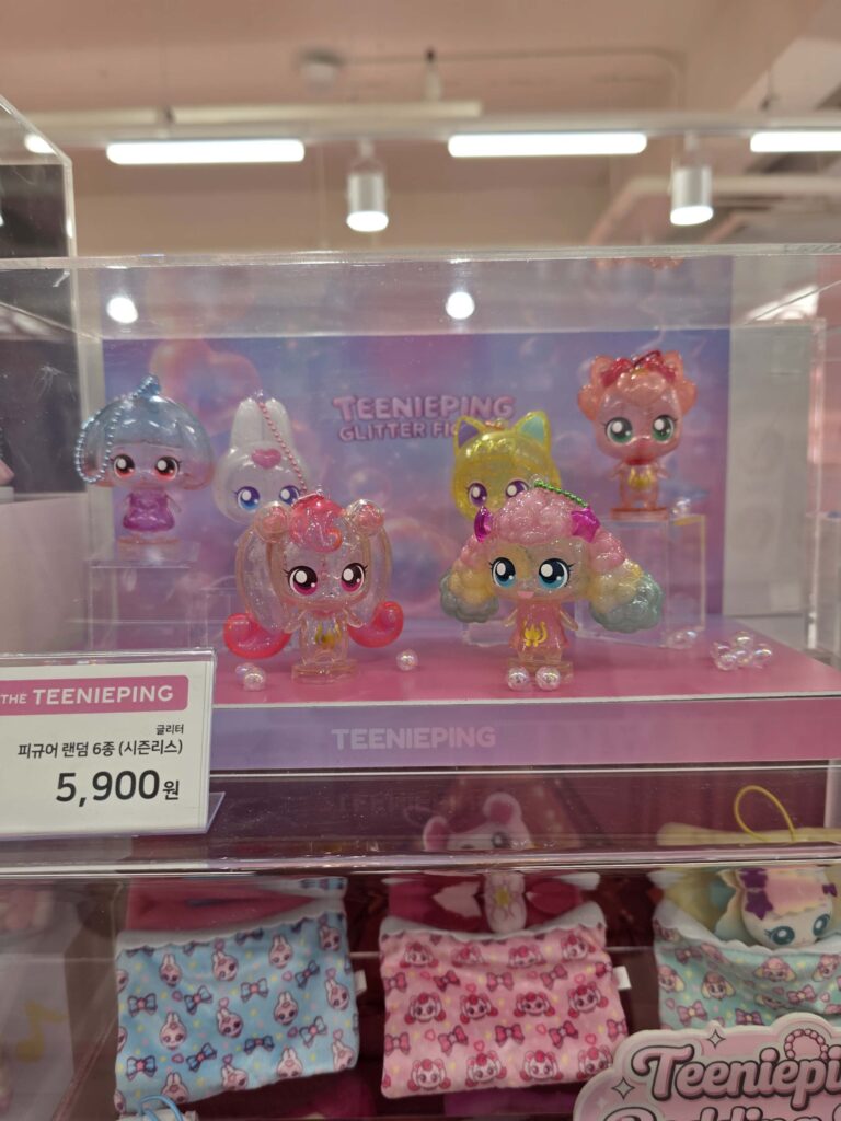 Various Teenieping dolls and collectible figures