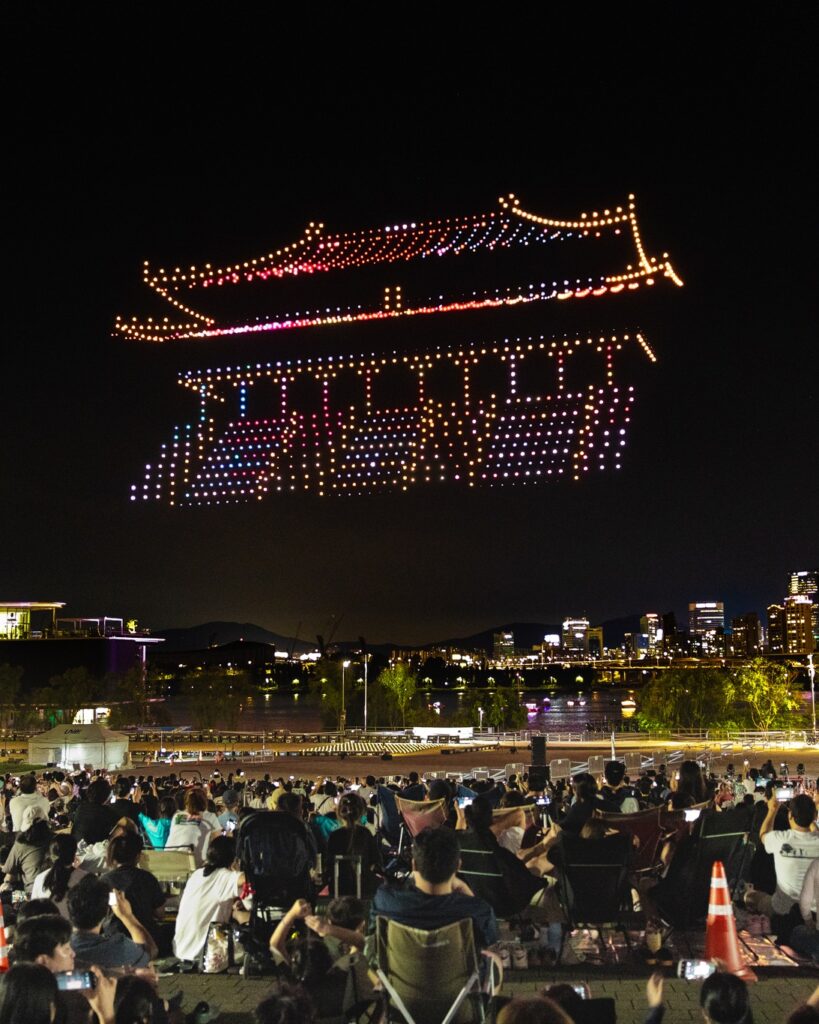 Seoul night skyline with drone light show performance